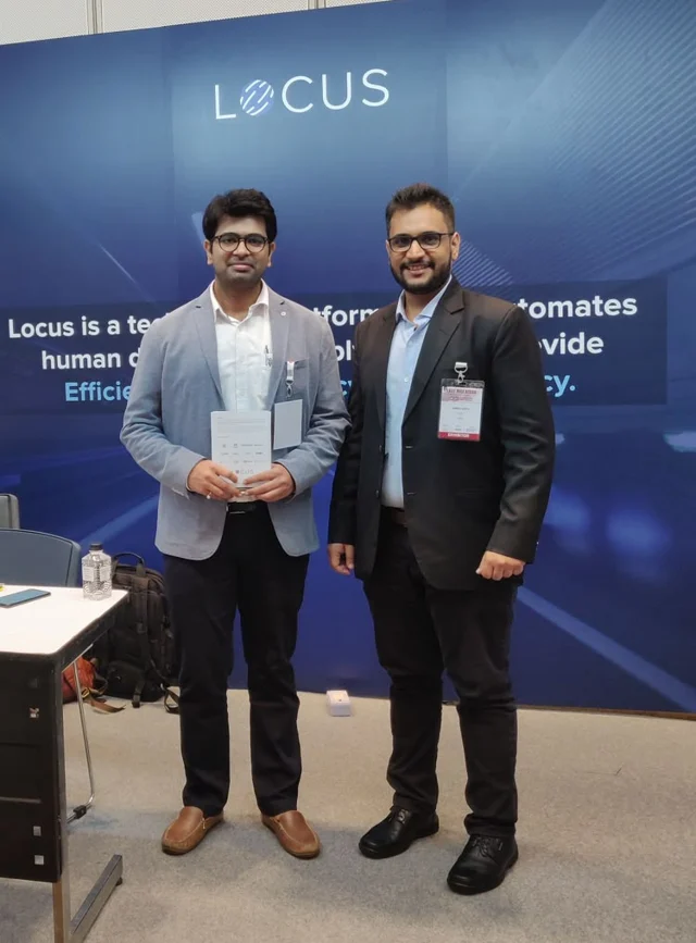 Shobhit Gupta, right, at the Locus stand at the Last Mile ASEAN Conference and Expo 2019